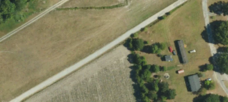 Riverfront Acreage with Storage Building