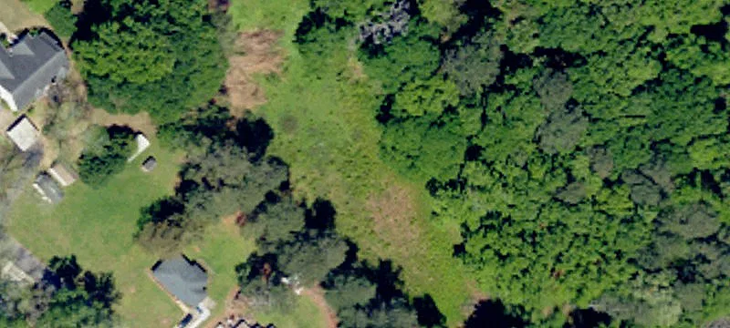 Partially Cleared Outside-City Land Lot
