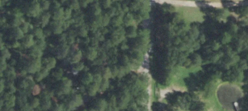 Wooded Residential Acreage with Home