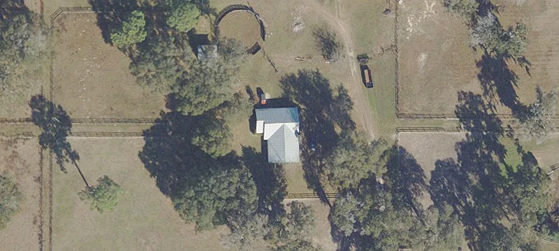 Fenced Horse Farm with Barn