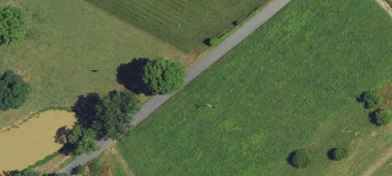 Sloped Residential Building Lot with Pond