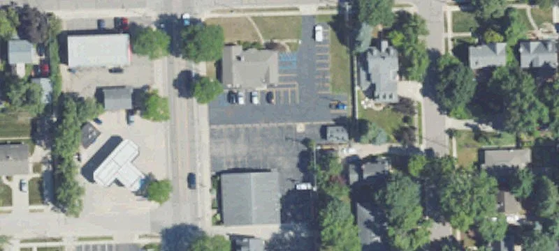 Corner Retail Storefront with Two Curb Cuts