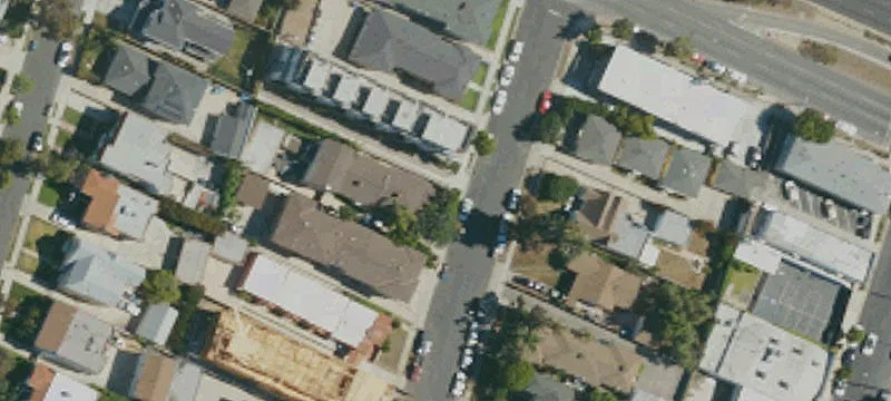 Spanish Triplex with Four-Car Garage