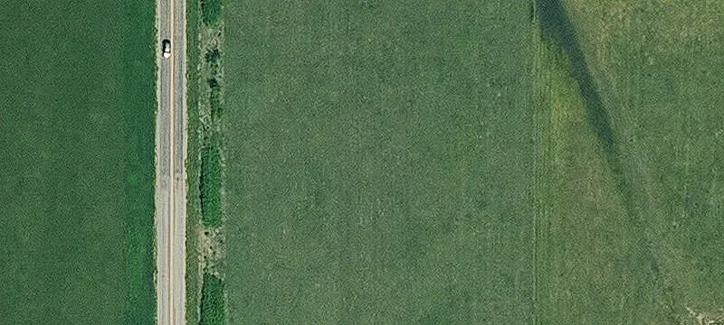 Fenced Farmland with Pond