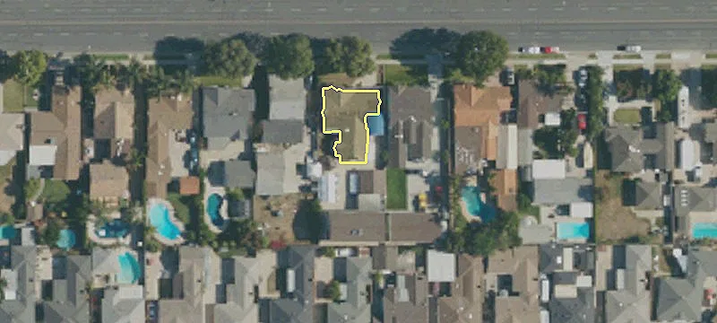 Two Detached Residences with 7 Garages