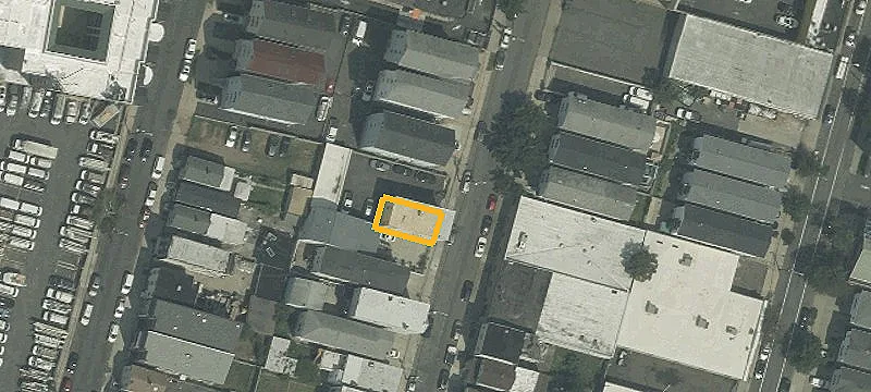 Three-Family Home with Extra Lot