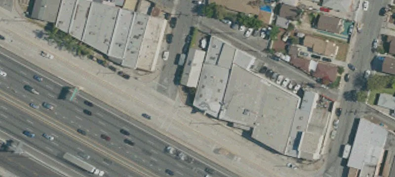 Corner Warehouse with Fenced Yard