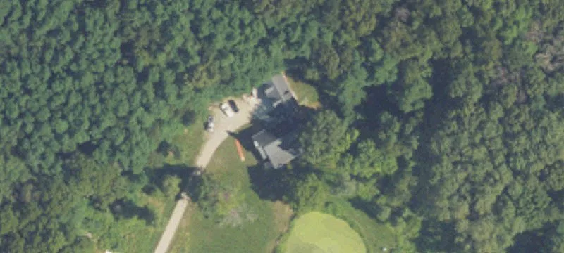 Wooded Land Parcel with Stream Frontage