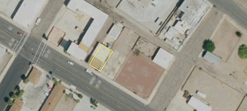 Fenced Downtown Commercial Lot