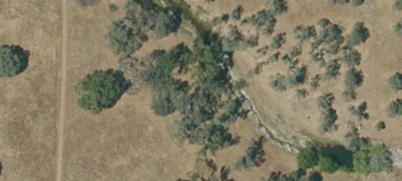 Ranch Land with Ponds and Fencing