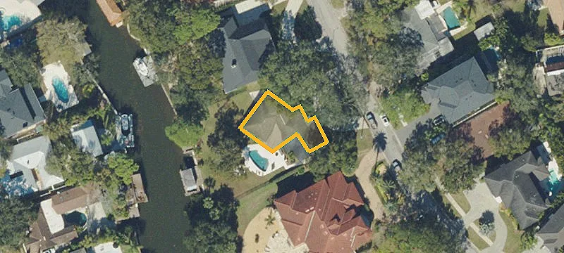 Waterfront Land with Covered Boathouse