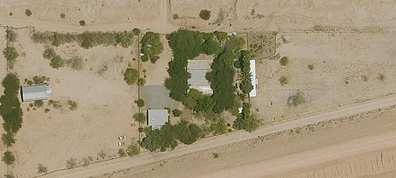 Fenced Desert Land with Park Model