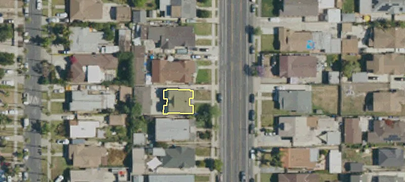 Charming Triplex with Fully Fenced Lot