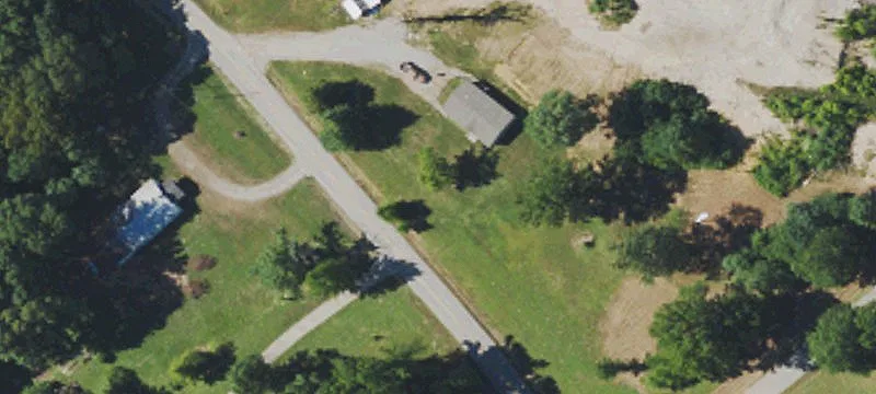 Mostly Wooded Land with Cleared Sites