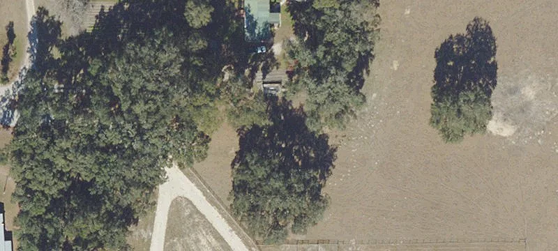 Fenced Ranch Land with Barn