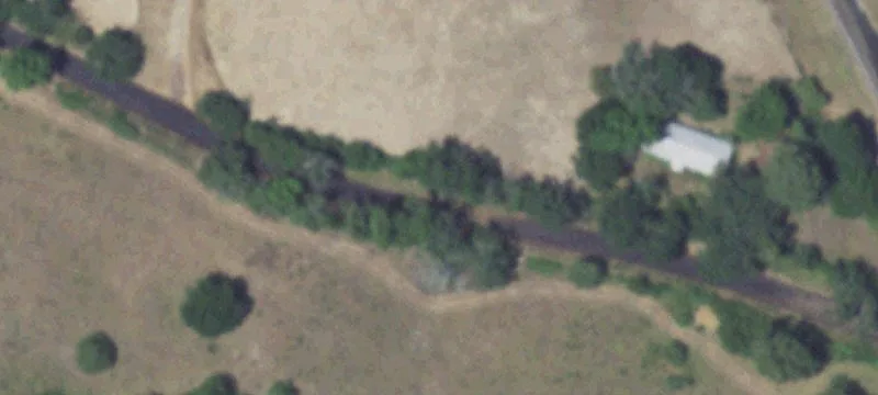 Wooded Acreage with Unfinished Home