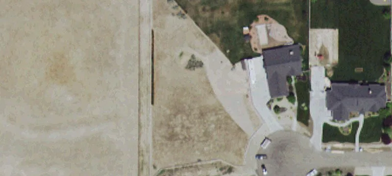 Residential Building Lot with Vinyl Fence