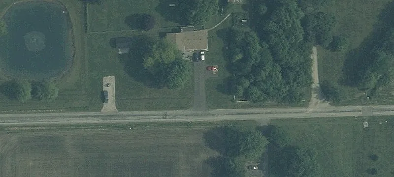 Partially Wooded Acreage with Pole Barns