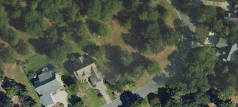 Wooded Homesite in Gated Golf Community