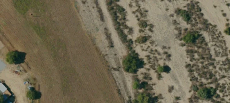 Fenced Acreage with Multiple Homes