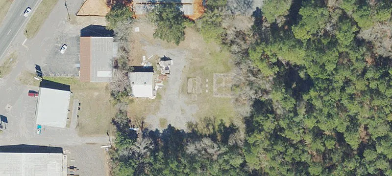Fenced Industrial Laydown with Building