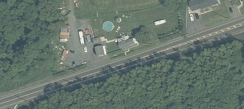 Zoned Land with Farmhouse