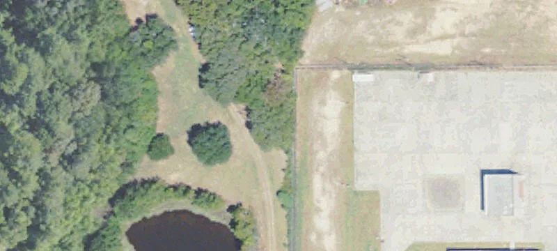 Secluded Waterfront Acreage with Pond