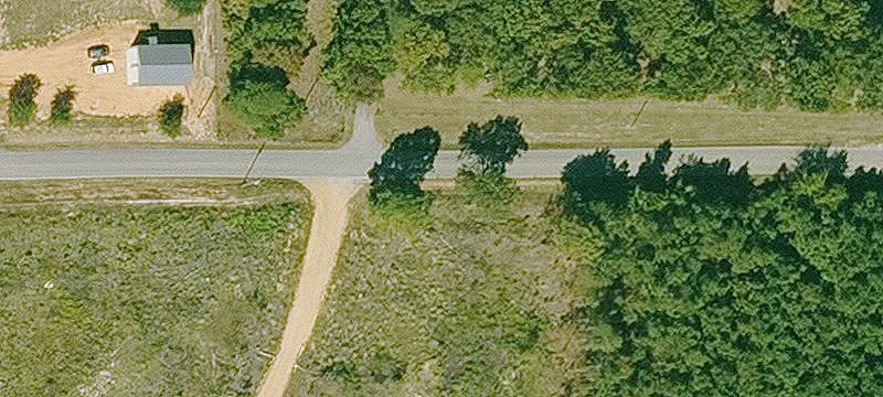 Wooded Acreage with Road Utilities