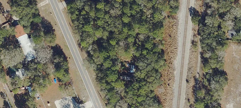 Heavily Wooded Homesite with Cleared Area