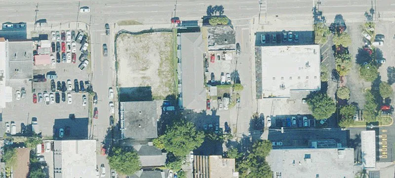 Corner Development Site with Approved Plans