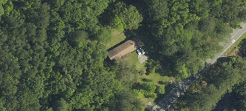 Wooded Acreage with Block Building