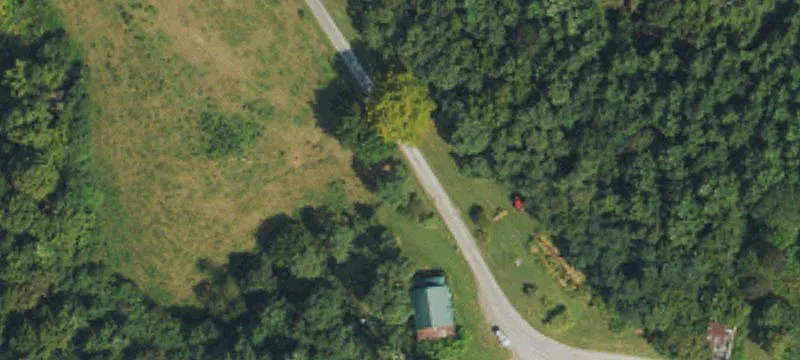 Land with Barn and Creek