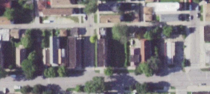 Brick Triplex with Retail Storefront