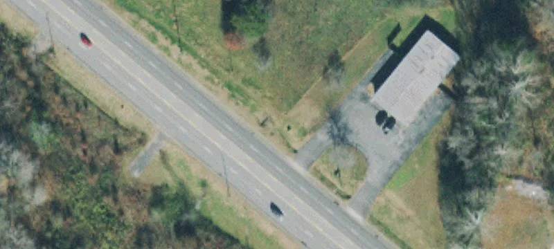 Retail Building with Road Sign