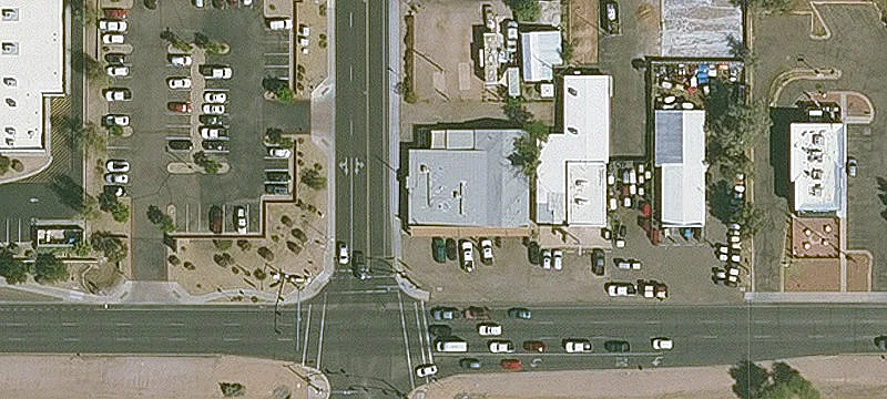Retail-Automotive Building with Vehicle Gate