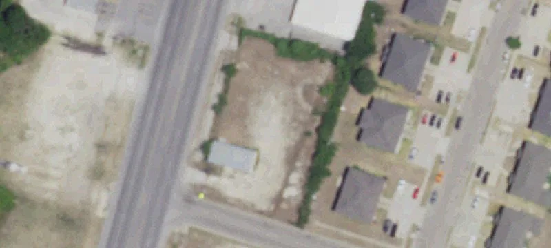 Corner Lot with Metal Building