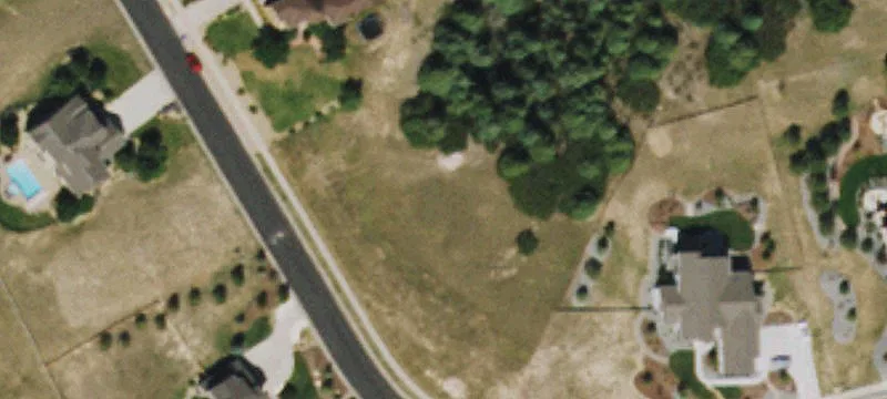 Sloped Vacant Home Lot