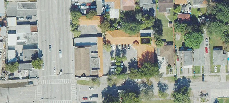 L-Shaped Parking Lot with Two Entrances