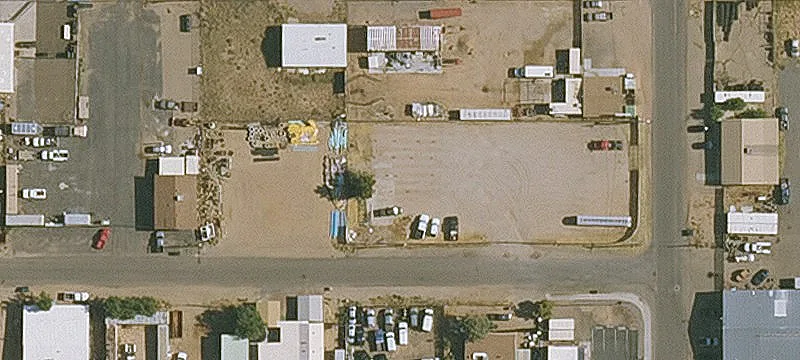 Fenced Corner Industrial Lot