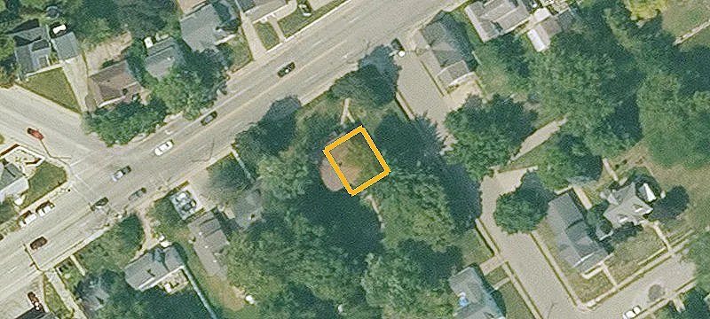 Brick Two-Story Home with Enclosed Porch