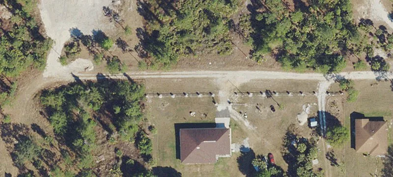 Fenced Waterfront Acreage Lot