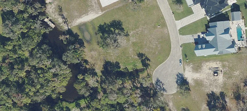 Canal Waterfront Lot in Gated Community