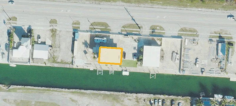 Three-Story Mixed-Use Building with Boat Lifts