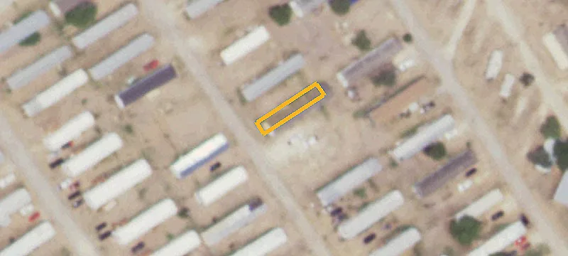 Triangle-Shaped Land Parcel with Road Access