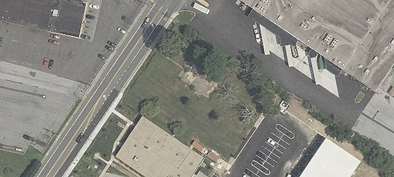 Fenced Commercial Land Lot