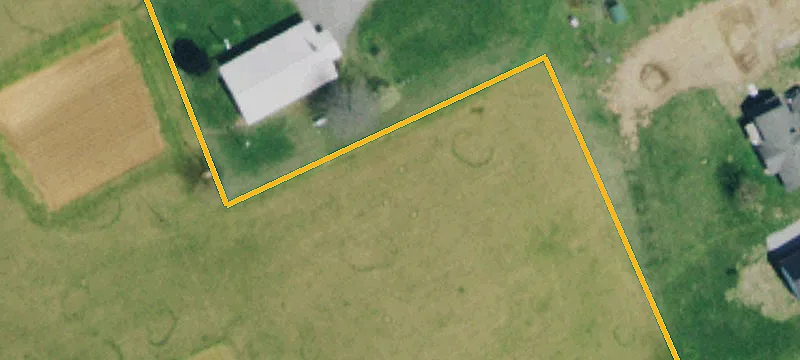 Fenced Rolling Land with Barn