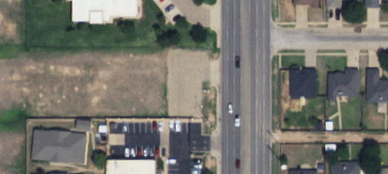Paved and Fenced Retail Land Tract