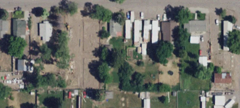 Buildable Lot with Shop Garage