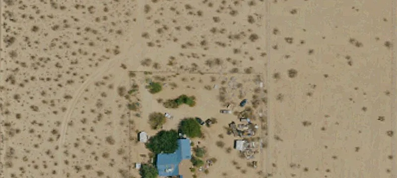 Fenced Level Desert Land Parcel