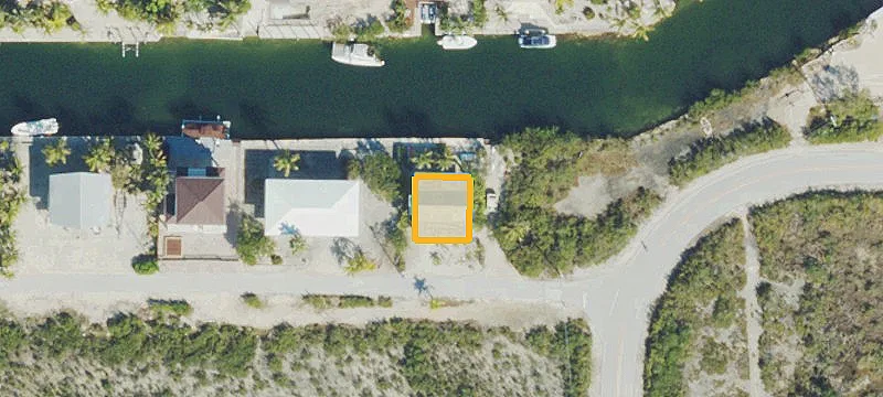 Canal-Front Corner Home Lot